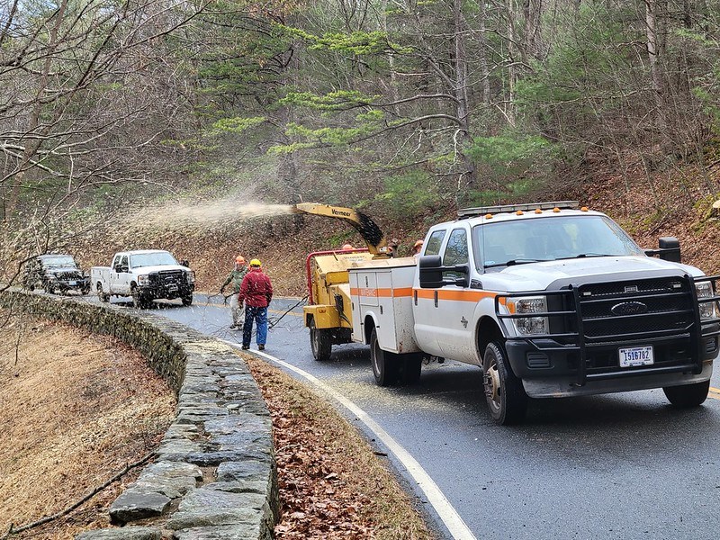 Ice Storm 2023 cleanup crew Crews chipping wood