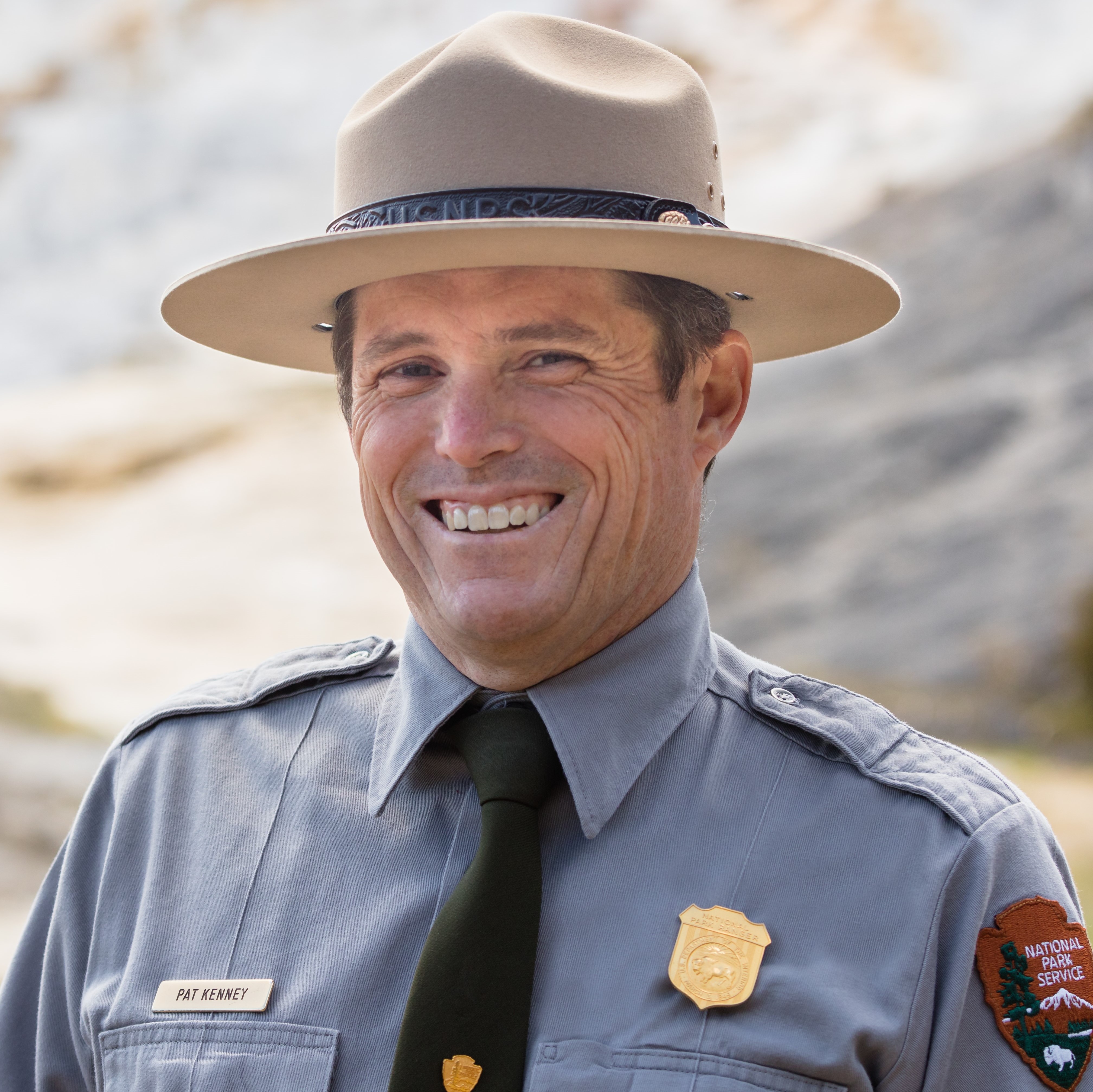 Patrick Kenney A man in an NPS uniform smiles