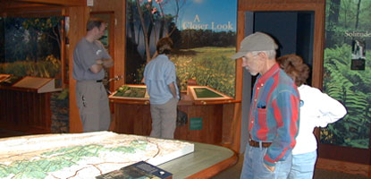 Visitors at Dickey Ridge Visitor Center learn about Shenandoah at the "Experience Shenandoah" exhibit. Visitors at Dickey Ridge Visitor Center learn about Shenandoah at the "Experience Shenandoah" exhibit.