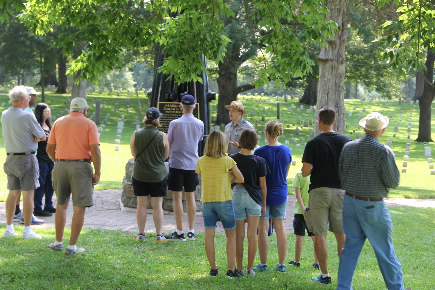 Park Ranger talking to a group of people in a National Cemetery