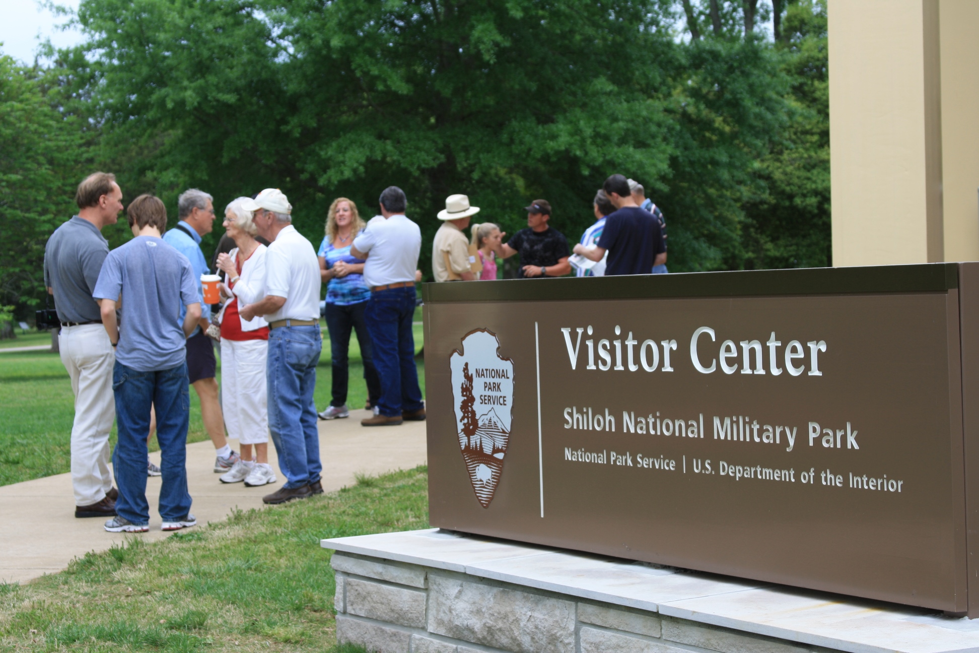 Visitors standing in front of the visitor center