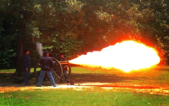 Union Cannon Fire - NPS Photo Reenactors in Union uniforms fire a cannon