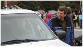 Sen. Mark Begich greets Sitka NHP Supt Randy Larson