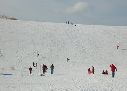 Sledding at The Dune Climb
