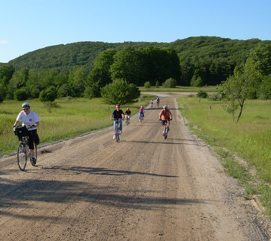 Visitors enjoy bicycling the back roads of Sleeping Bear Dunes National Lakeshore.