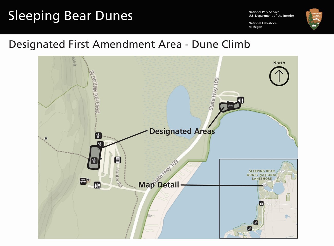A map of the Dune Climb Area. A section on the west side of the Dune Climb parking lot is marked in grey. A section south of the Glen Lake Picnic Area is marked in grey. These area are the first amendment areas. There is a smaller inset map of the park.