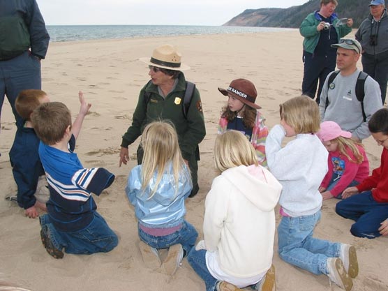 Junior Rangers-to-be explore the beach at Sleeping Bear Dunes National Lakeshore. Junior Rangers-to-be explore the beach at Sleeping Bear Dunes National Lakeshore.