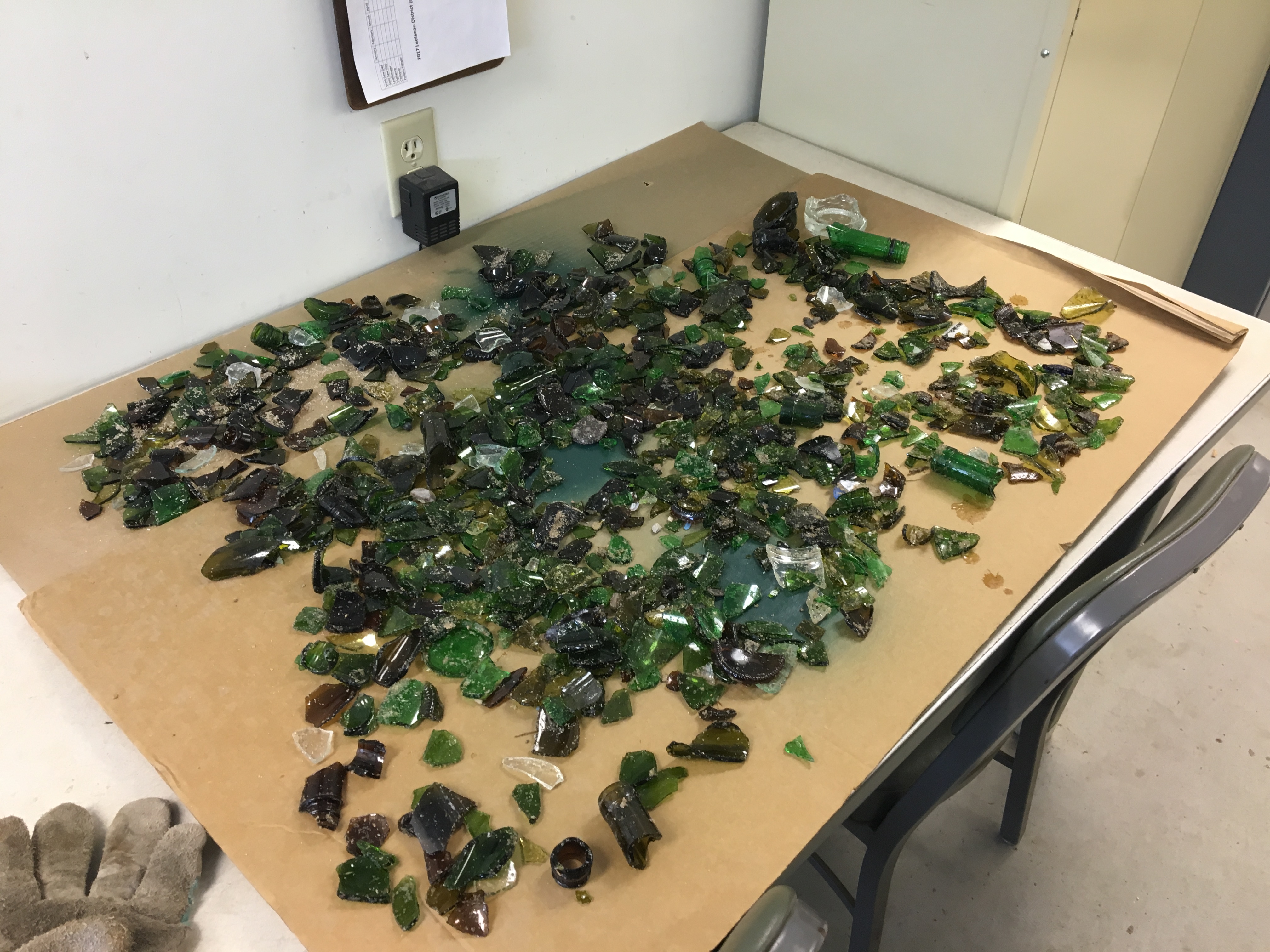 Broken glass spread out on table