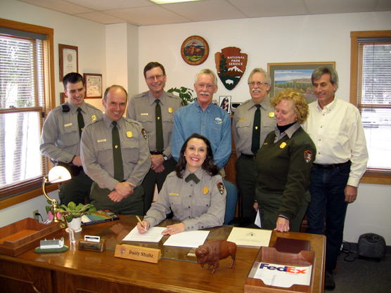 Superintendent Dusty Shultz signs the General Management Plan.