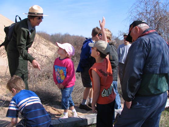 Visitors to Sleeping Bear Dunes National Lakeshore enjoying a ranger-led hike.