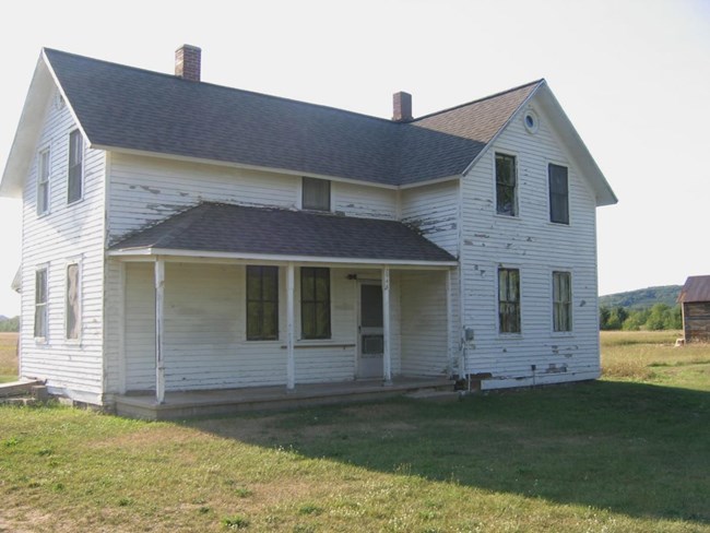 White, clapboard farmhouse