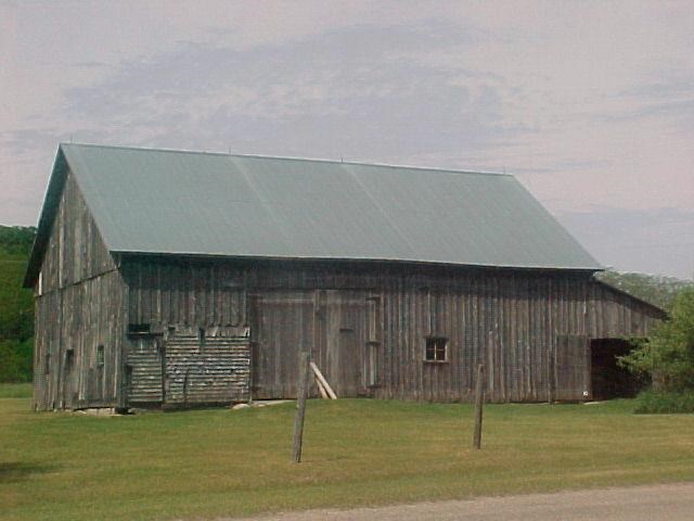 Large grey-sided barn