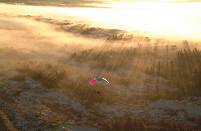 paragliding over Lake Michigan shoreline