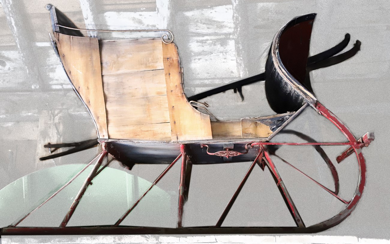 Old wooden sleigh with metal rails