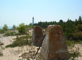 Foundations for the watch tower for the US Life-Saving Service. Note the Lighthouse in the background.