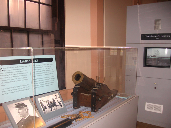 Lyle Life Saving gun display with video kiosk in background