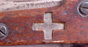 Close-up of the 2nd Division, 6th Corps insignia cut into Pvt. Chase's rifle musket
