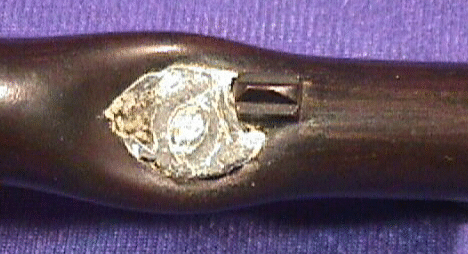 The bullet embedded in the battle-damaged M1861 rifle musket
