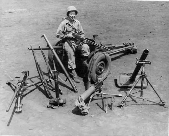 US WWII soldier with American weapons