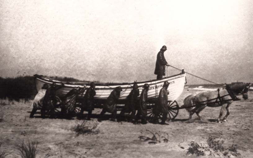 Life Saving Service surf boat being hauled to the water