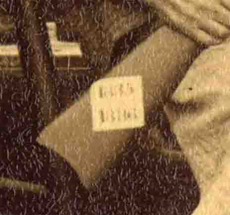 Close-up of the note on the rifle butt