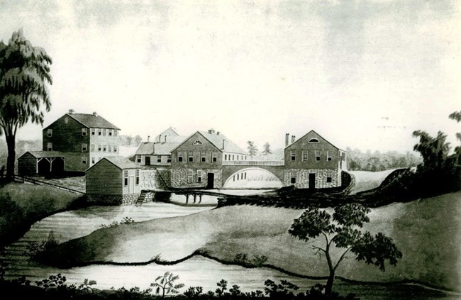 Painting of Water Shops in "primitive" style. Buildings in the middle. Deck arch bridge between to buildings in center. Pond or river and land in foreground. Trees in background and on right and left.