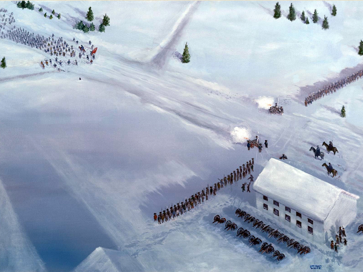 A battle occuring on snowing ground with soldiers gathered on the left in a column and others on the right near a building.