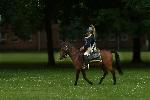 A lone horse soldier from the 2nd Continental Dragoons moves across the parade ground at Springfield Armory National Historic Site