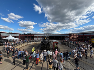 crowd gathered around historic turntable