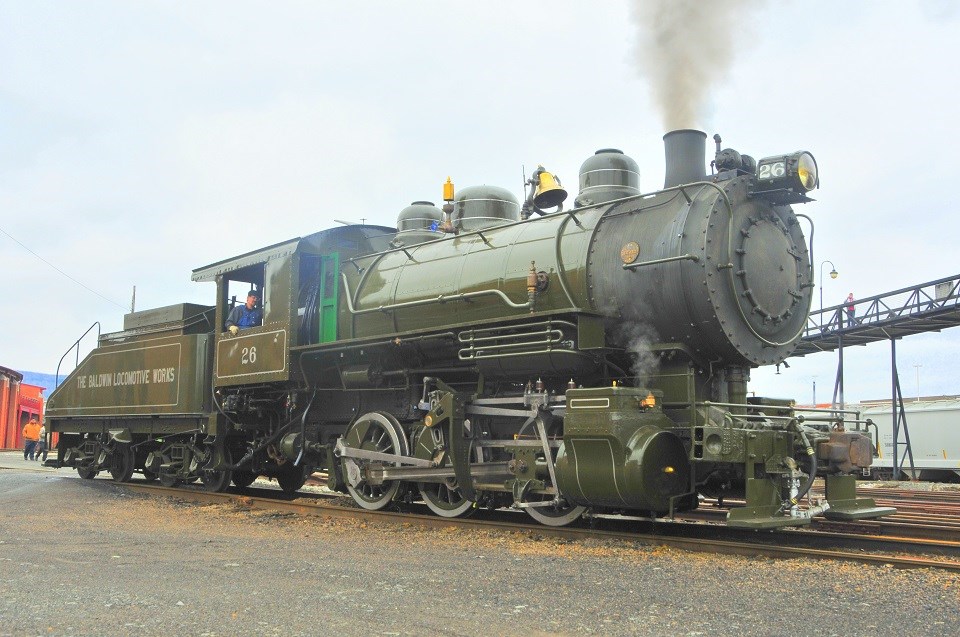 Baldwin Locomotive Works #26 0-6-0 switcher Small switcher locomotive and tender in dark green paint