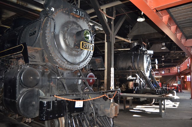 View of locomoitives 2317 and 3254 from the roundhouse floor