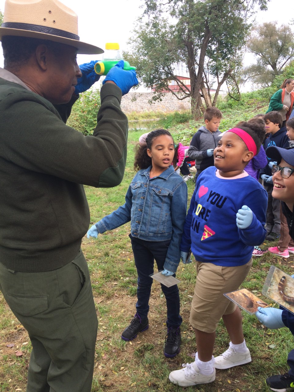 STEA Railroads, Rivers & You Education Program - river macroorganism viewing Ranger Ted explains how to identify macro-organisms