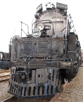 Front view of the Union Pacific Big Boy steam locomotive showing the black pilot (cowcatcher) and grey smokebox. Front view of the Union Pacific Big Boy steam locomotive showing the black pilot (cowcatcher) and grey smokebox.