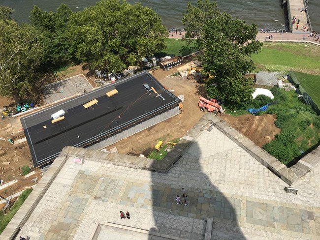 A photo of the construction happening for the new screening site taken from the top of the pedestal.