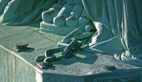 The Statueâs shackles and feet. 