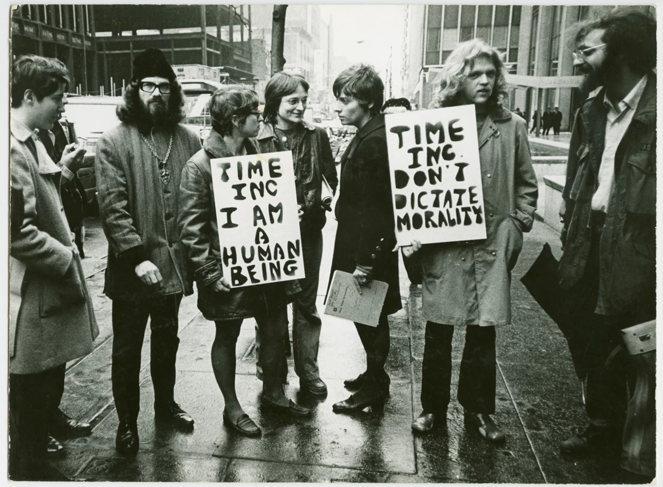 Gay Liberation Front Picketing at the Time-Life Building, 1969 People protesting with signs reading 'Time Inc. I am a human being'