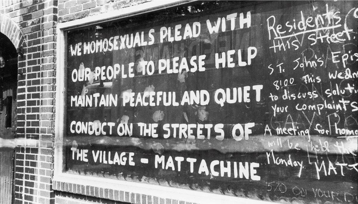 Hand-painted text on a boarded up window of the Stonewall Inn, text reads 'We homosexuals plead with our people to please help maintain peaceful and quiet conduct on the streets of the Village - Mattachine'