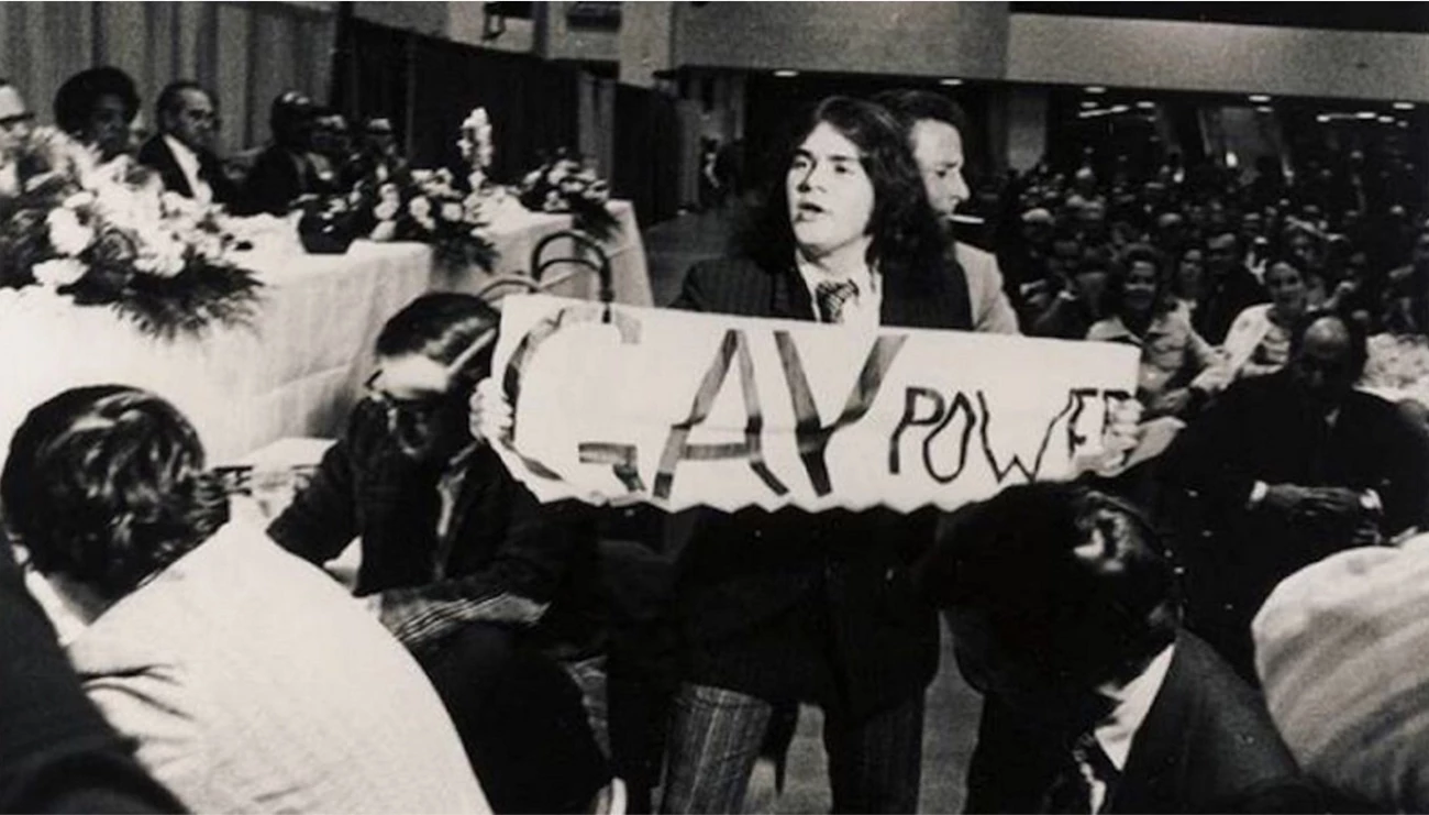 Mark Segal Crashes a Nixon Fundraiser, 1972 Mark Segal holding a sign that read 'Gay Power' at a Nixon fundraiser