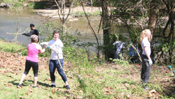 Volunteers clear invasive exotic plants from the bank of Lytle Creek. Volunteers clear invasive exotic plants from the bank of Lytle Creek.