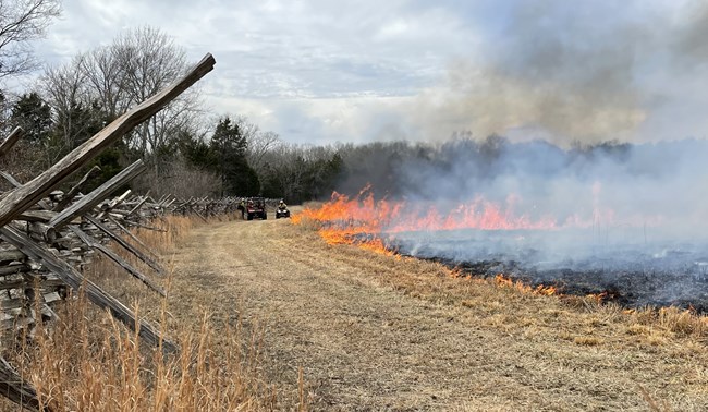prescribed fire being administered on the battlefield