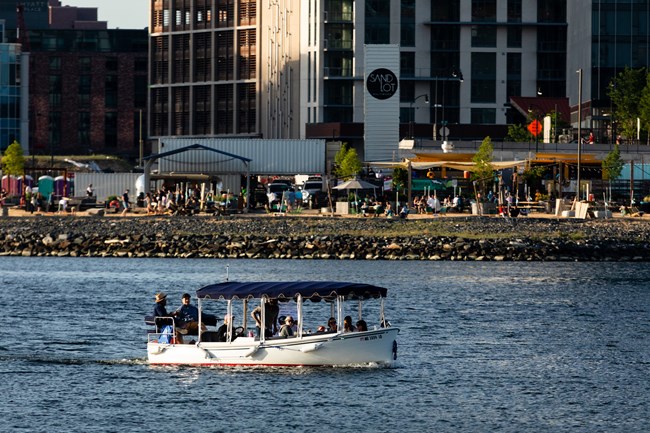 Picture of a boat on the water side portion of Fells Point, Baltimore