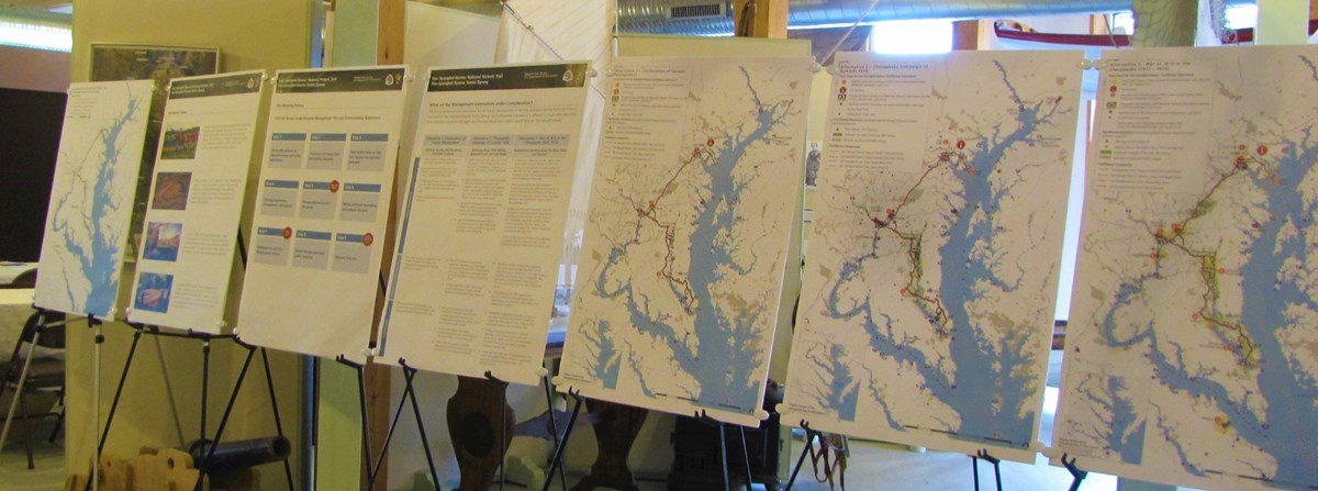 Maps are placed on easels for planning meeting.
