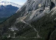 road carved into hill slope