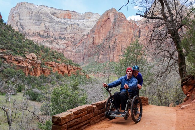 Hiker using a Mountain Trike off-road wheelchair on a trail in Zion National Park