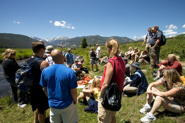 lt= Photograph of students listening to a NPS air resources division presenter during a field trip to Rocky Mountain NP, Colorado.