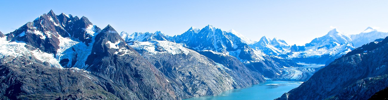 Panoramic mountain scene near Glacier Bay National Park and Preserve.