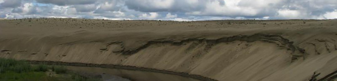 Kobuk Valley Sand Dunes Cloudy skies and brown sand dunes of Kobuk Valley