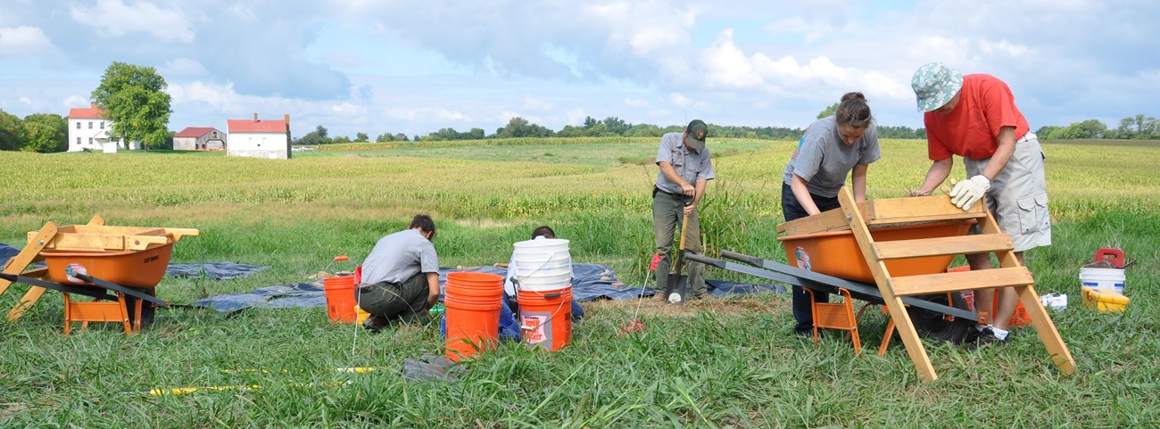 Archeologists in the field. NPS photo.