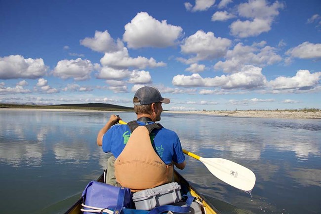 A man paddles on the Noatak River.