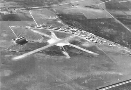 Brooks Field 1939 Two landing strips criss-crossing with buildings behind them